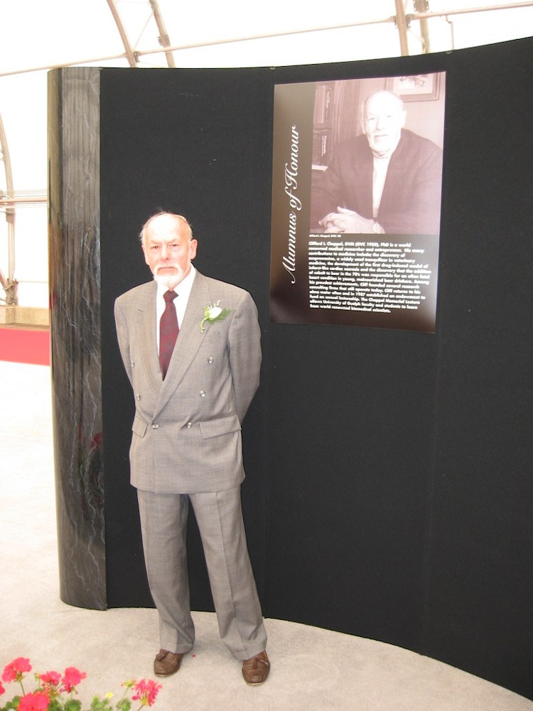 Clifford Chappel stands in front of an exhibit at the OVC Awards in 2003